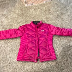 reversible pink and gray North Face jacket